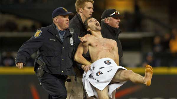 Yankee fan running on the field