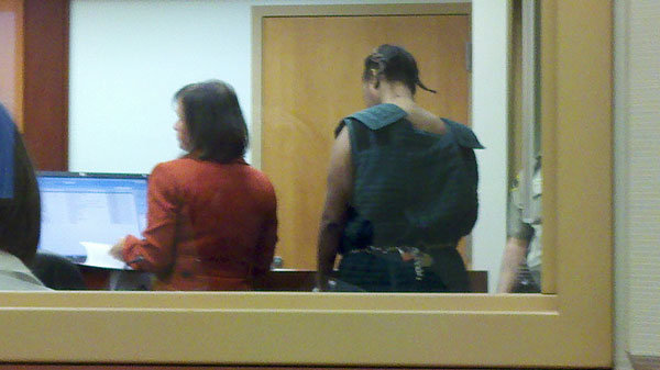 Tacoma woman accused of running over friend with SUV pleads not guilty ...
