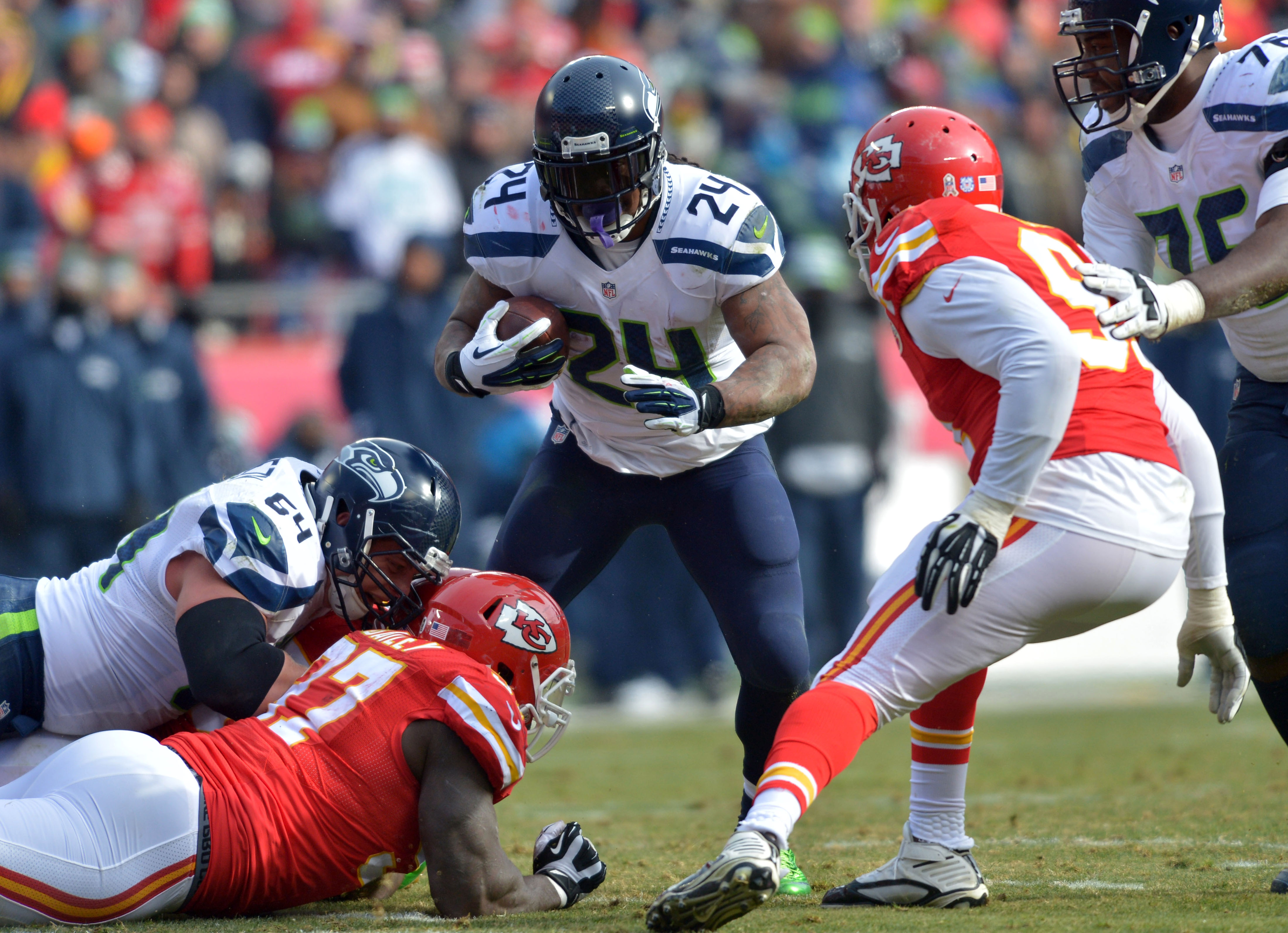 Seattle Seahawks' Marshawn Lynch runs during the first half of an