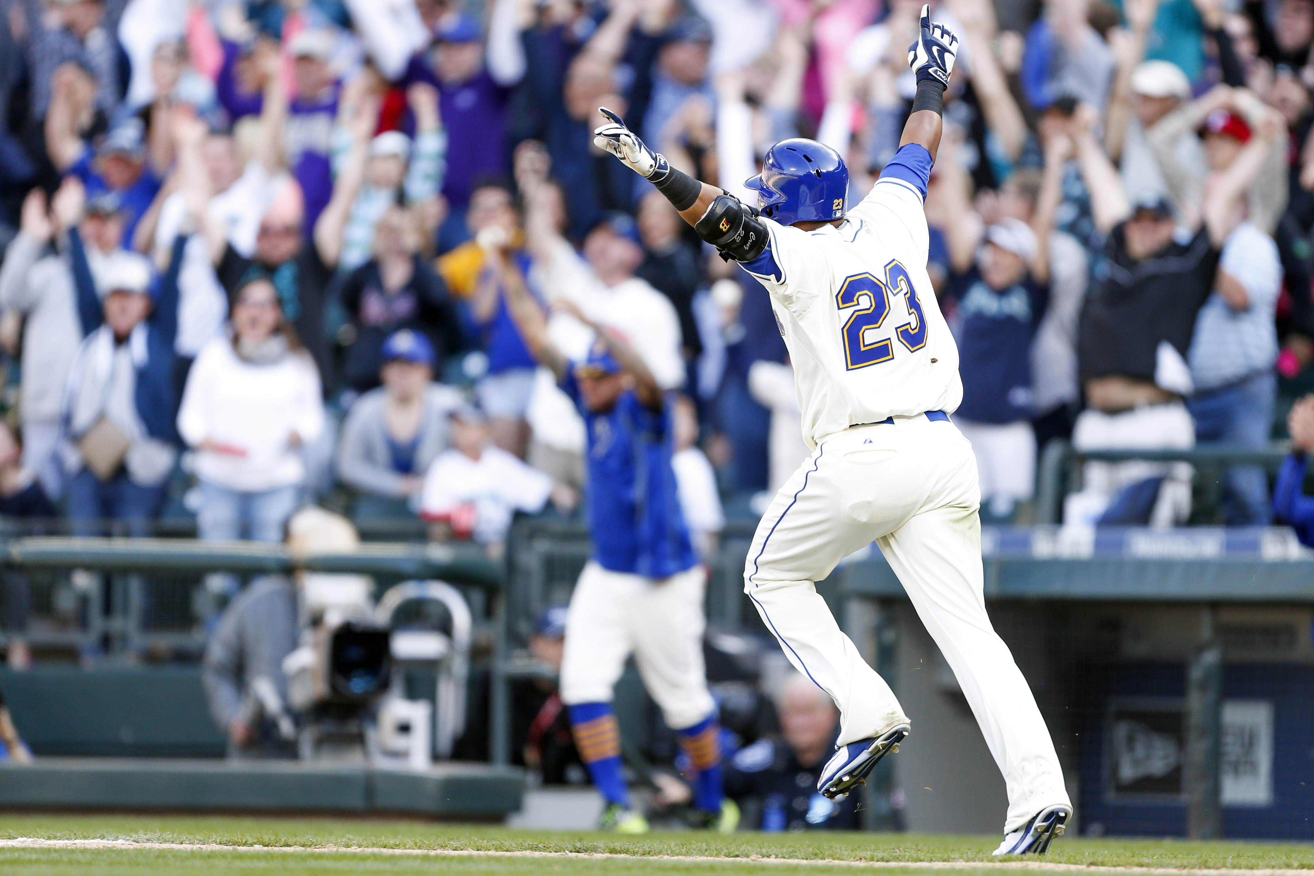 Seattle Mariners' Robinson Cano swings at a pitch in front of