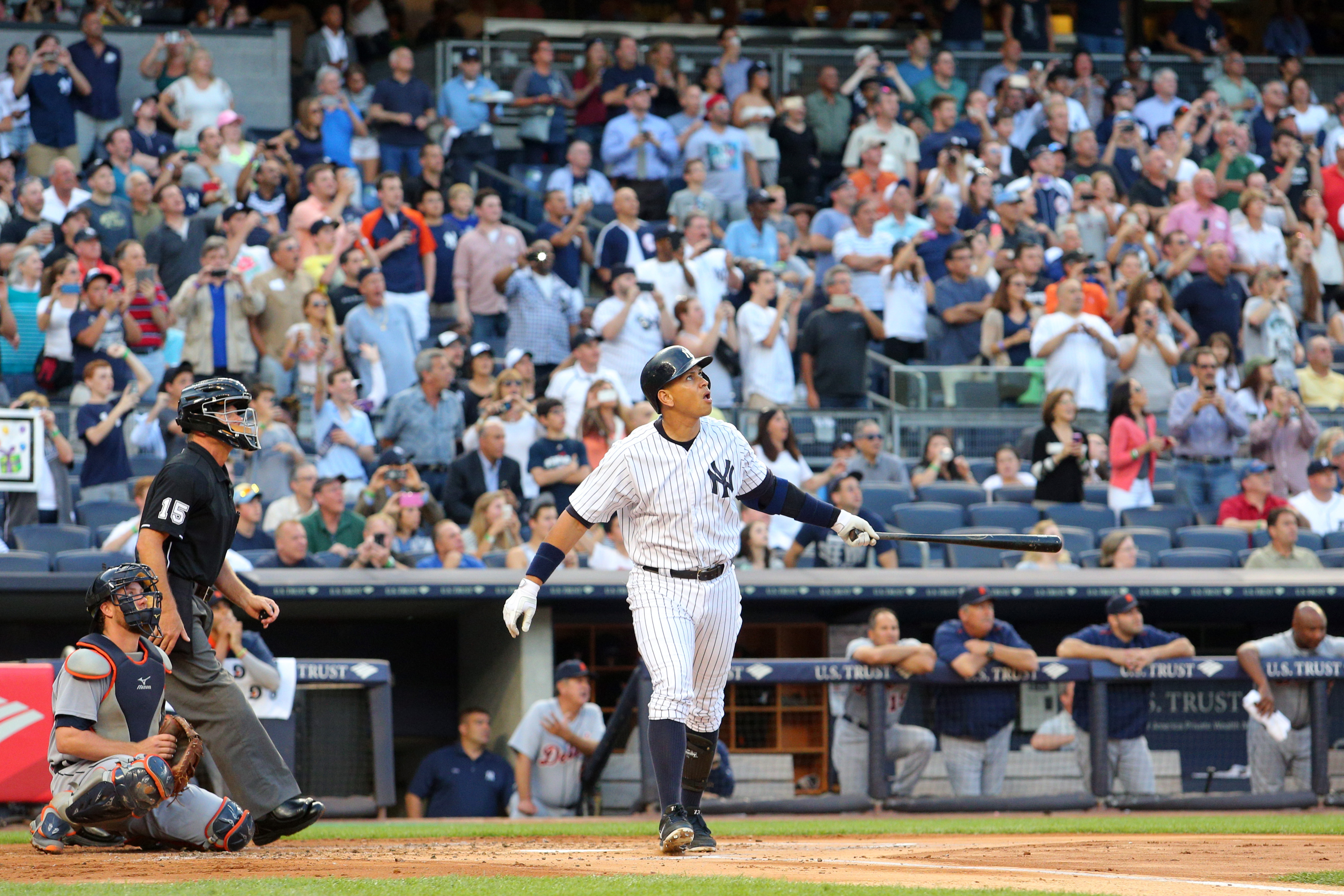 New York Yankees Alex Rodriguez hits a solo home run against the
