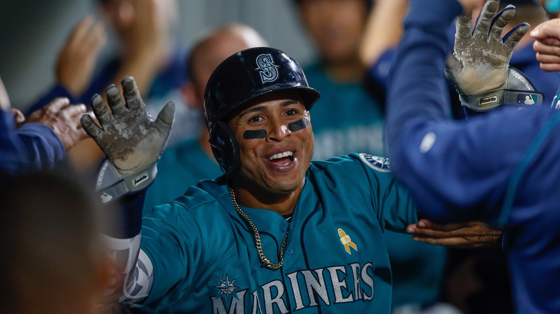 Mariners score 9 in 2nd inning, hold off Angels 11-8