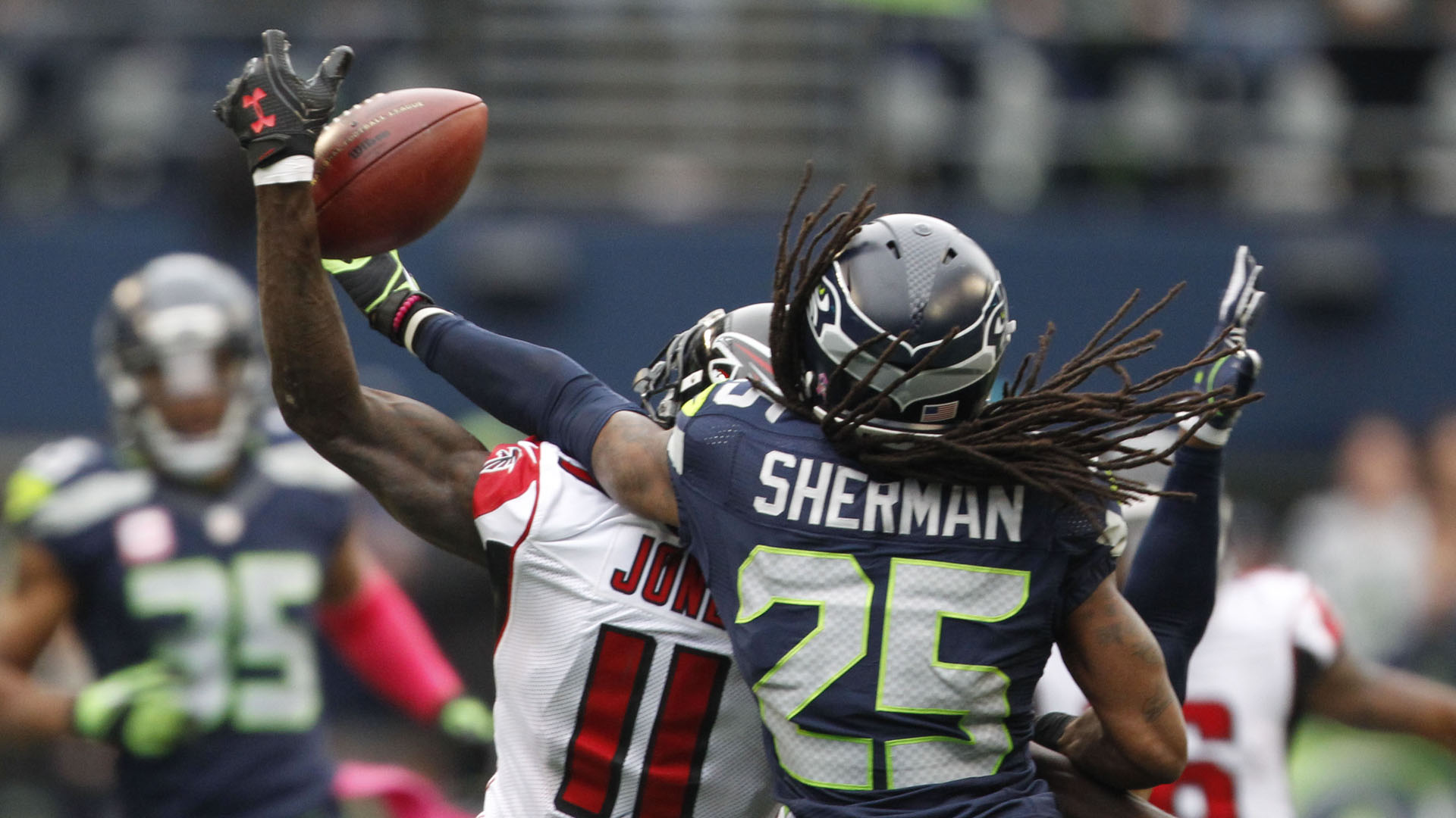 Falcons' Julio Jones hobbled, but gets best of Sherman