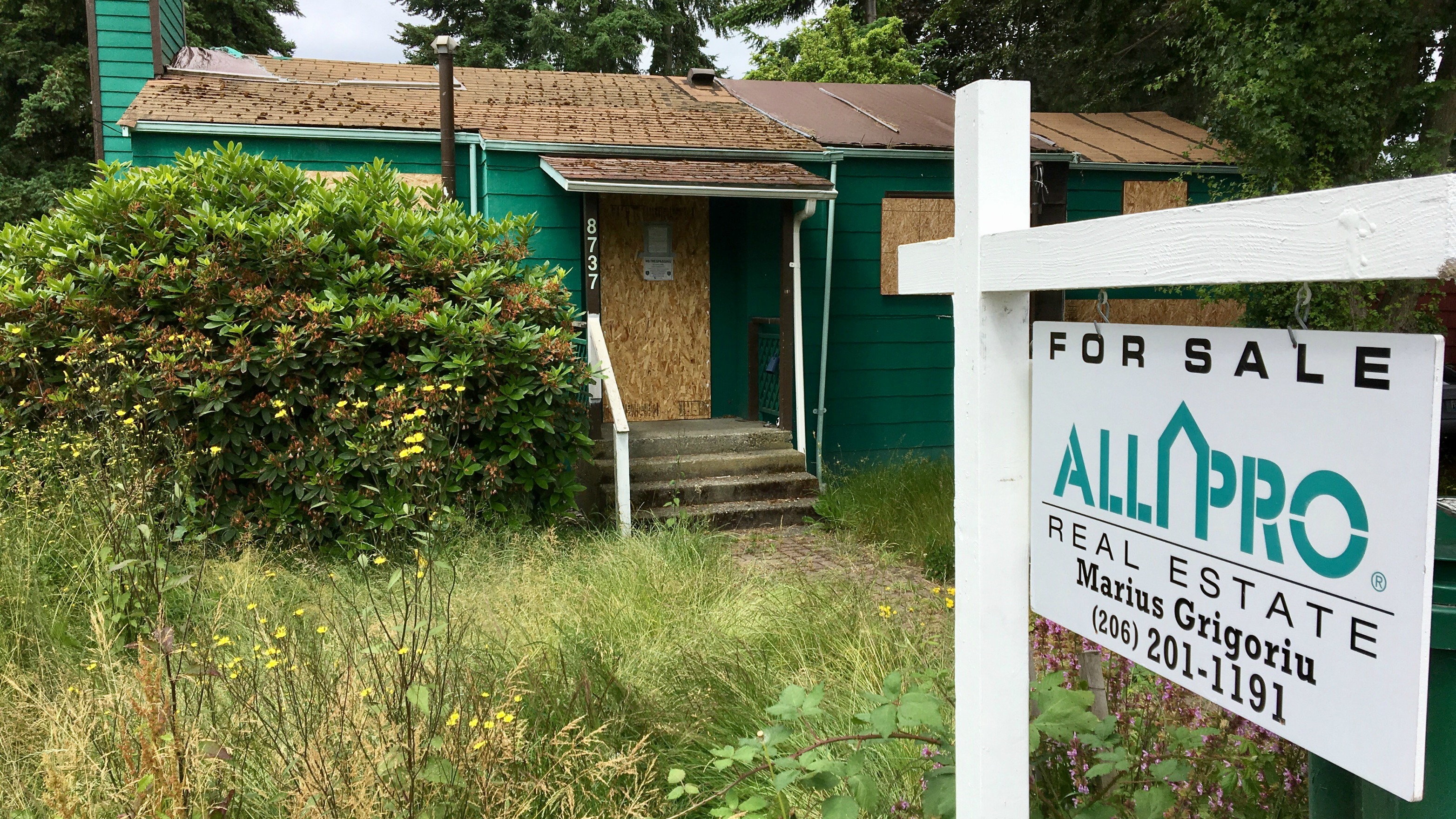 Boarded-up house selling for $448,000
