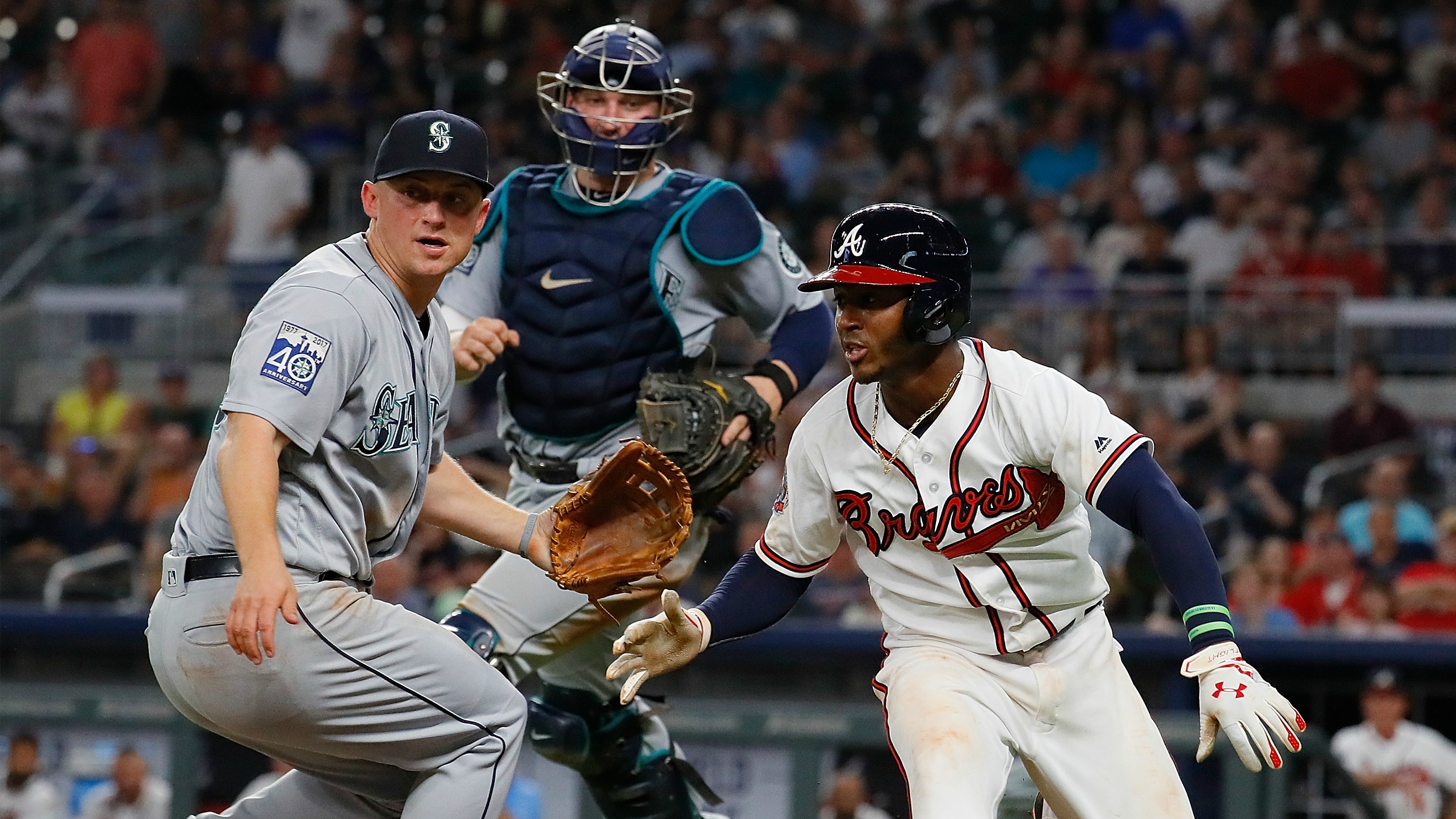 Braves score on crazy play, beat Mariners 4-0