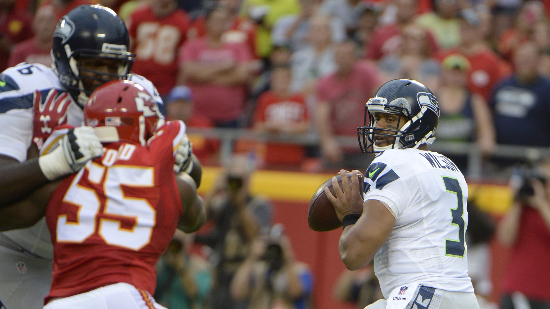 Aug 21, 2015; Kansas City, MO, USA; Seattle Seahawks quarterback Russell  Wilson (3) warms up prior to the game against the Kansas City Chiefs at  Arrowhead Stadium. (John Rieger/USA Today Sports)