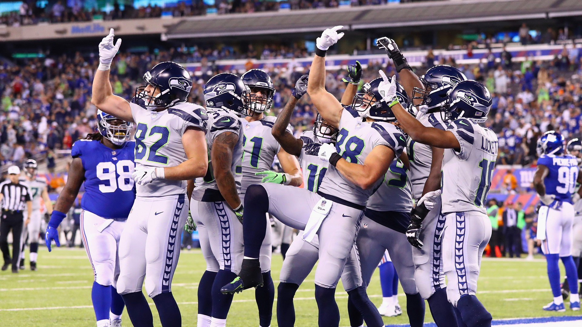 Jimmy Graham of the Seattle Seahawks watches from the sideline during