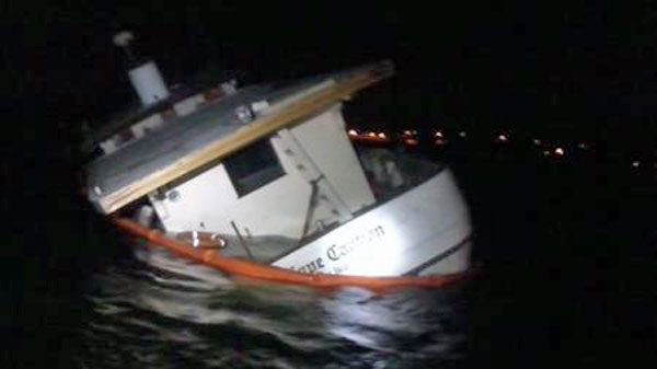 67-foot boat runs aground, sinks off Everett | king5.com